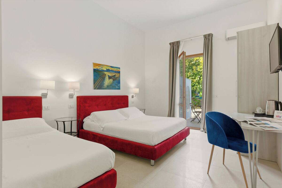 Classic Triple Room | Minibar, in-room safe, individually furnished, desk