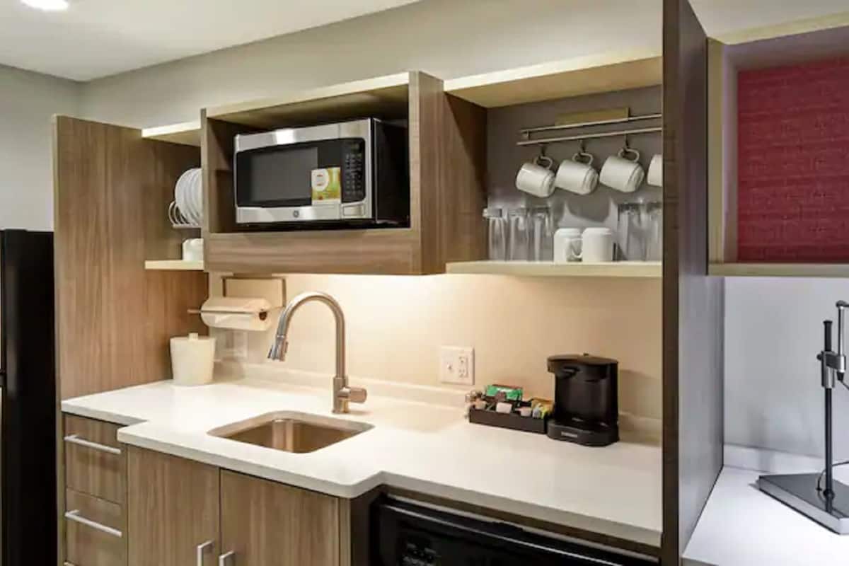 full-sized fridge, microwave, dishwasher, coffee/tea maker