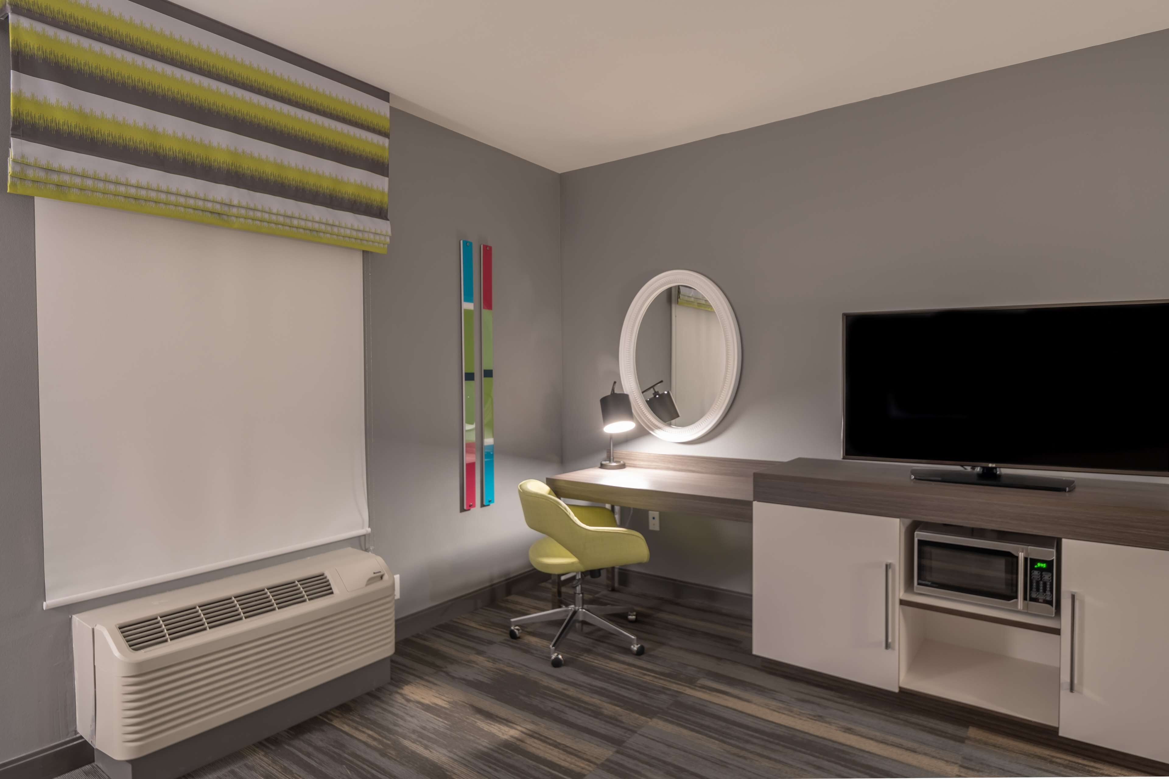 room, 1 king bed with sofa bed, refrigerator & microwave | in-room safe, desk, laptop workspace, free cots/infant beds