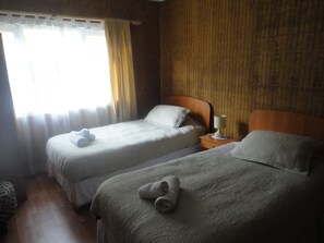 Triple Room, Private Bathroom, Courtyard Area | 1 bedroom, free WiFi, bed sheets