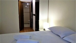 Apartamento | Wi-Fi de cortesia, roupa de cama