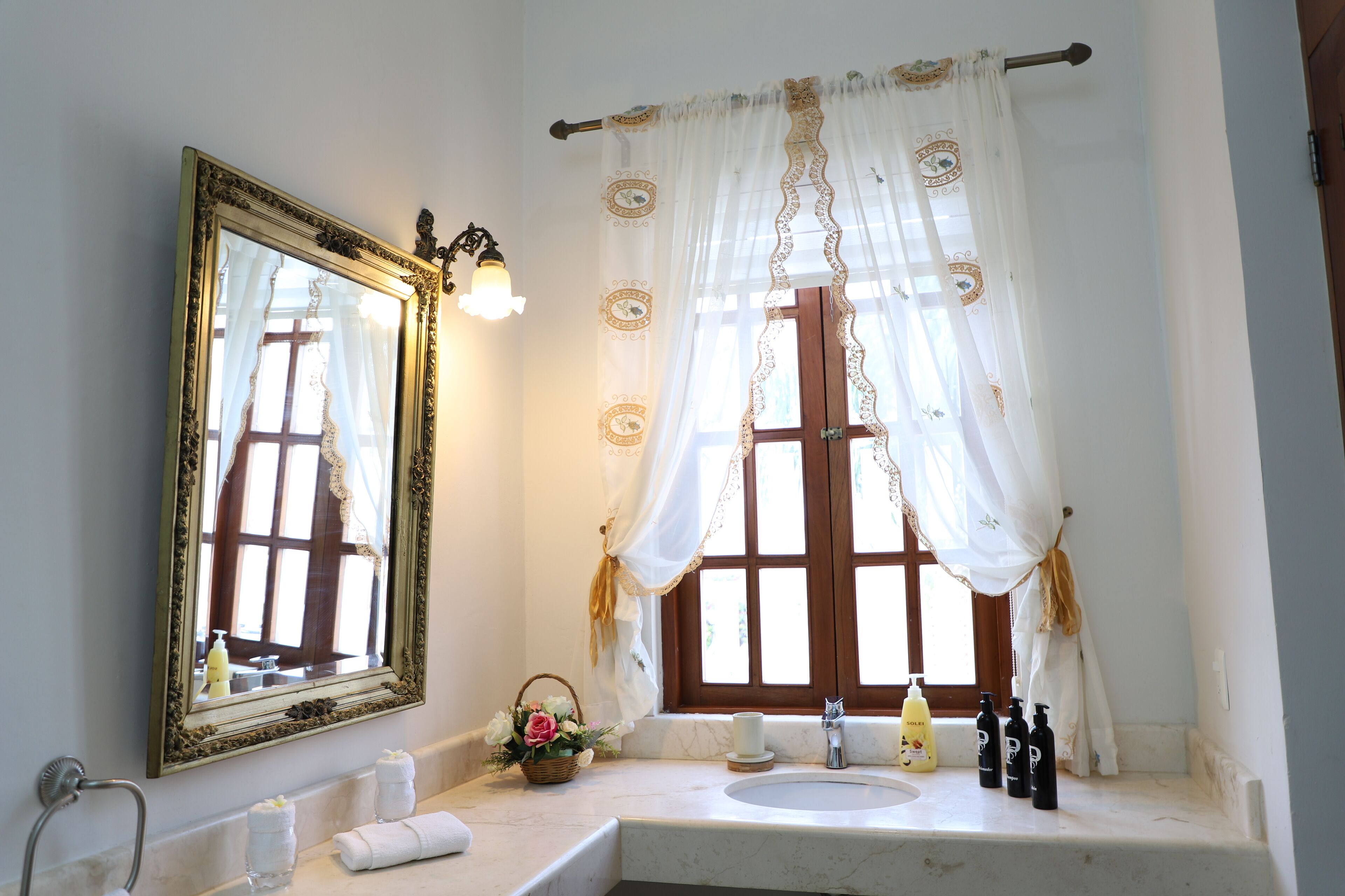 deluxe quadruple room, 2 queen beds | bathroom | shower, free toiletries, hair dryer, bathrobes