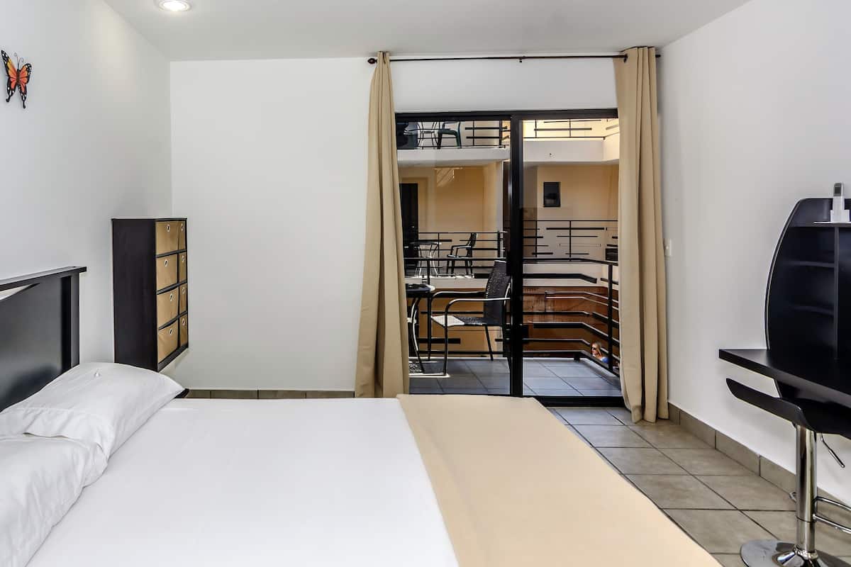 Deluxe Single Room, 1 Queen Bed, Refrigerator | 1 bedroom, desk, blackout drapes, iron/ironing board