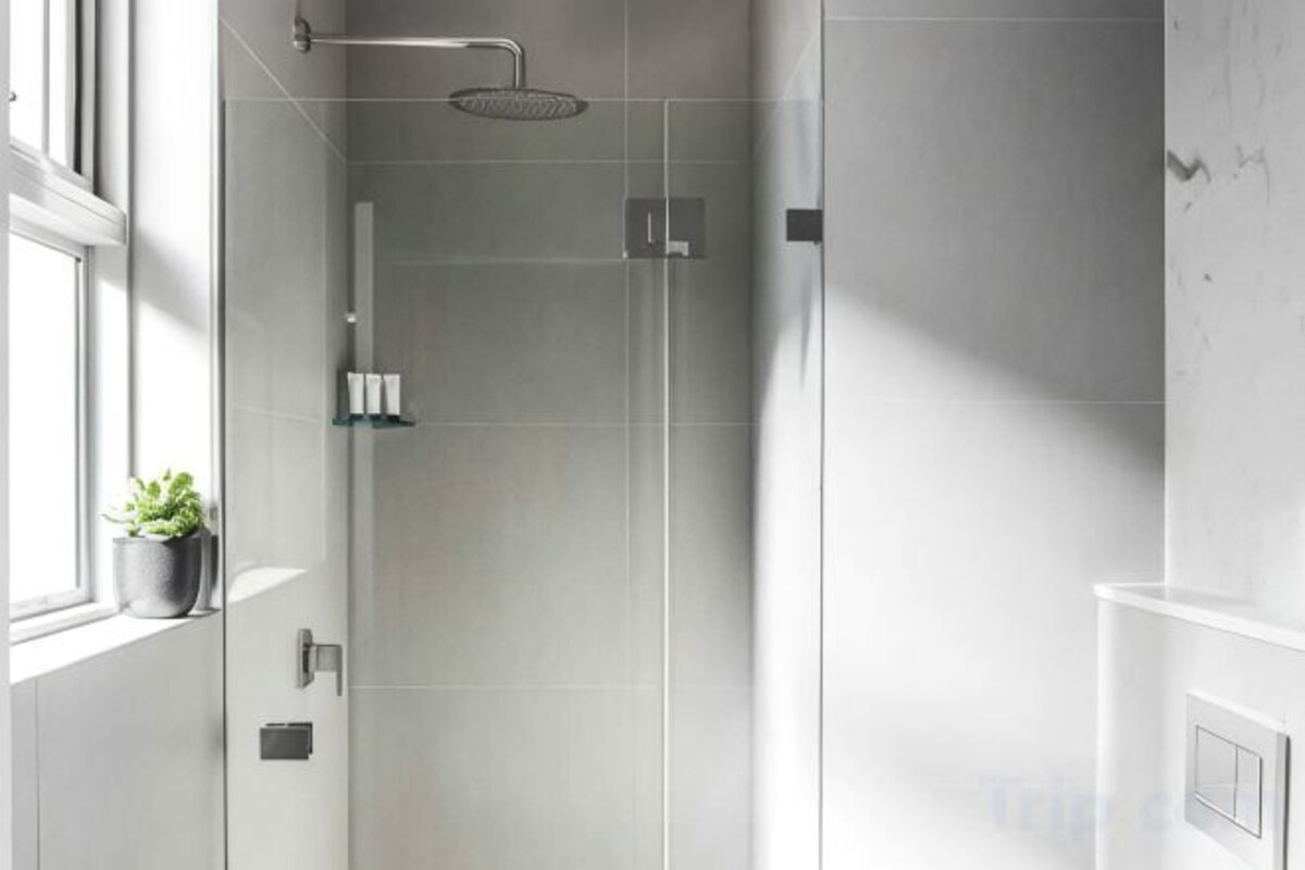 Bathroom | Shower, rainfall showerhead, hair dryer, slippers