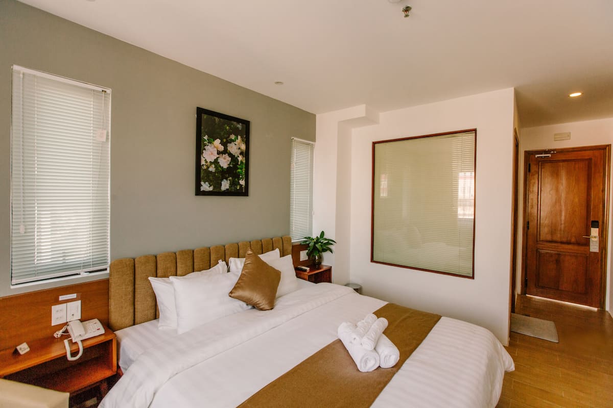 Standard Double or Twin Room | Minibar, in-room safe, desk, blackout drapes