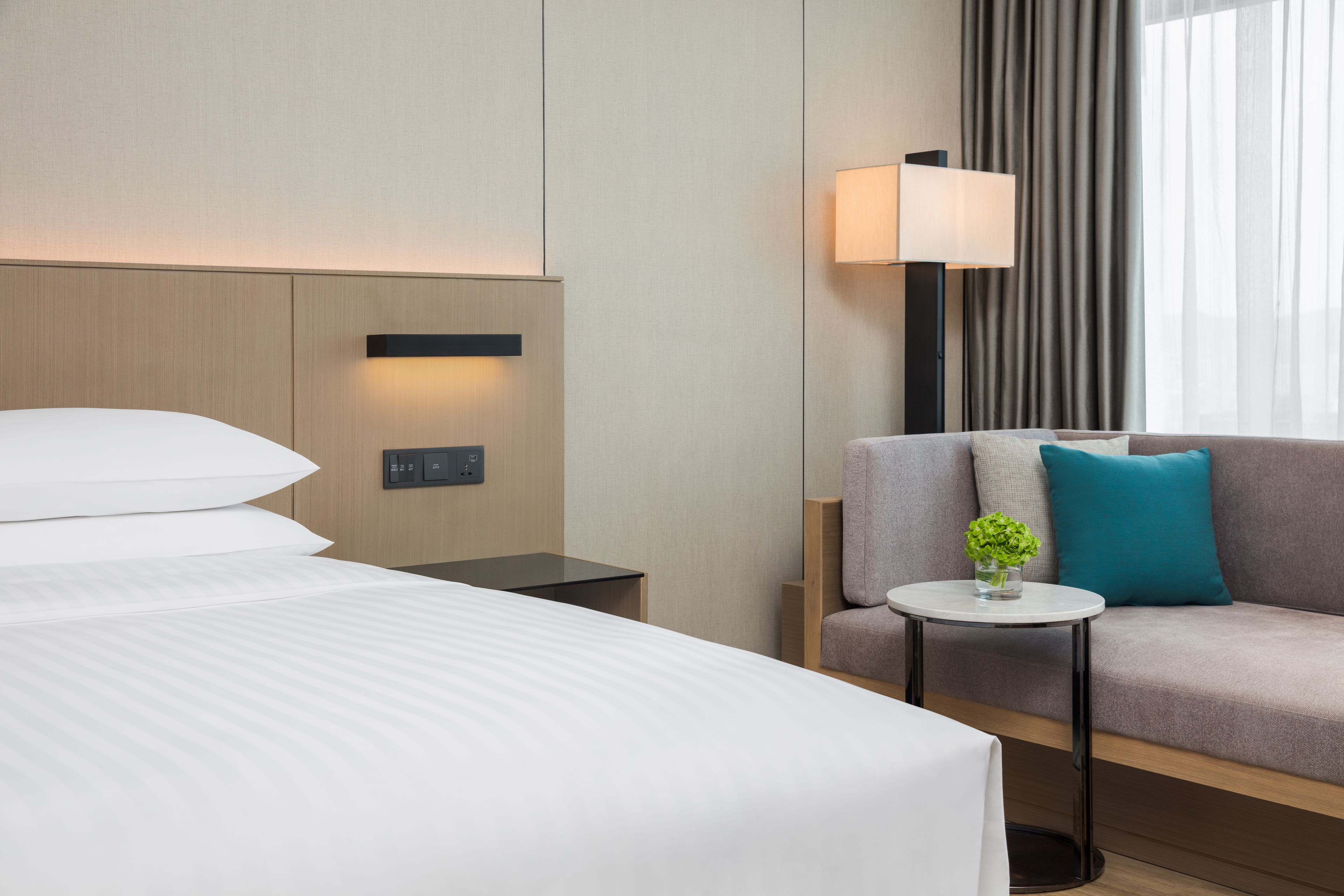 premium bedding, down duvets, minibar, in-room safe