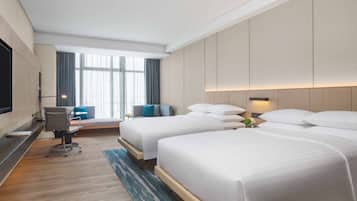 Premium bedding, down comforters, minibar, in-room safe