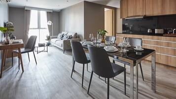 Suite, 2 Bedrooms | Private kitchen | Fridge, microwave, electric kettle
