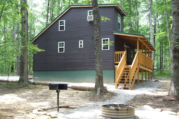 Side view of cabin - back porch and fire pit area