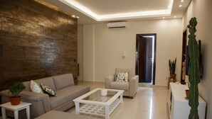 Departamento familiar, 2 habitaciones | Área de sala de estar