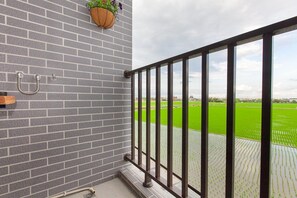 Habitación cuádruple familiar, para no fumadores | Balcón