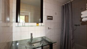 Shower, free toiletries, hair dryer, towels