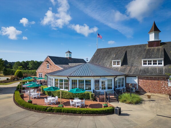 Stroll through the charming garden and enjoy a meal under the conservatory's glass walls.