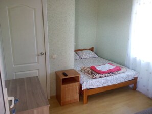Standard Room | Blackout drapes, iron/ironing board, free cribs/infant beds, free WiFi