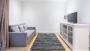 Suíte estúdio luxo, 2 quartos | Ferros/tábuas de passar roupa, Wi-Fi de cortesia, roupa de cama