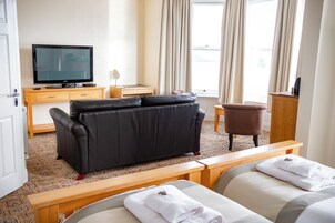 Premium bedding, desk, iron/ironing board, free wired internet