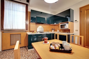 Apartment, 1 Bedroom | Private kitchen | Fridge, microwave, oven, dishwasher