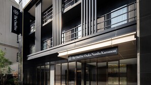 A modern building with a sign reading "The OneFive Osaka Namba Kuromon". - The OneFive Osaka Namba Kuromon (Osaka)
