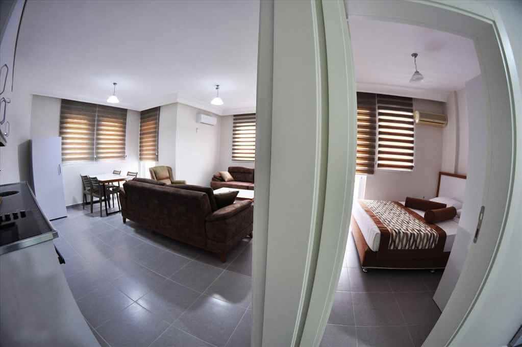 family room | 1 bedroom, premium bedding, minibar, in-room safe
