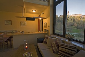 Apartment, 2 Bedrooms (OLTRE) | Living area | Flat-screen TV - Tenuta Tenaglia (Serralunga di Crea)