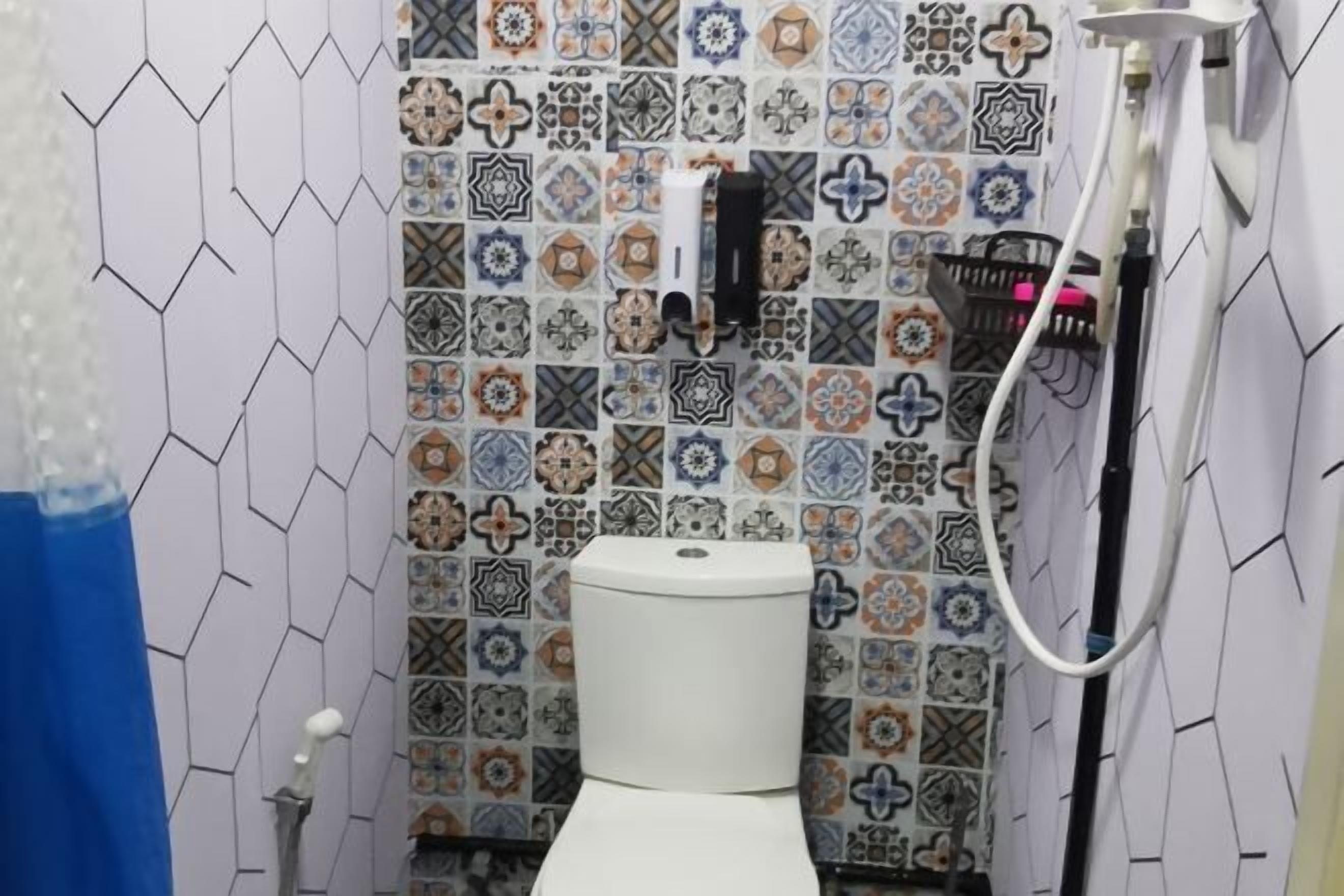 Shower, hair dryer, slippers, towels