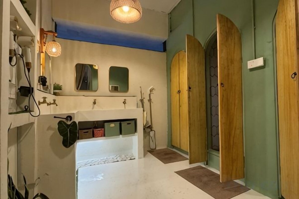 Shower, hair dryer, slippers, towels