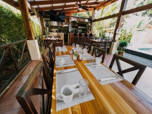 Breakfast, lunch, dinner served; Mediterranean cuisine, pool views