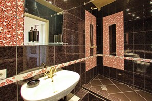 Shower, free toiletries, hair dryer, slippers