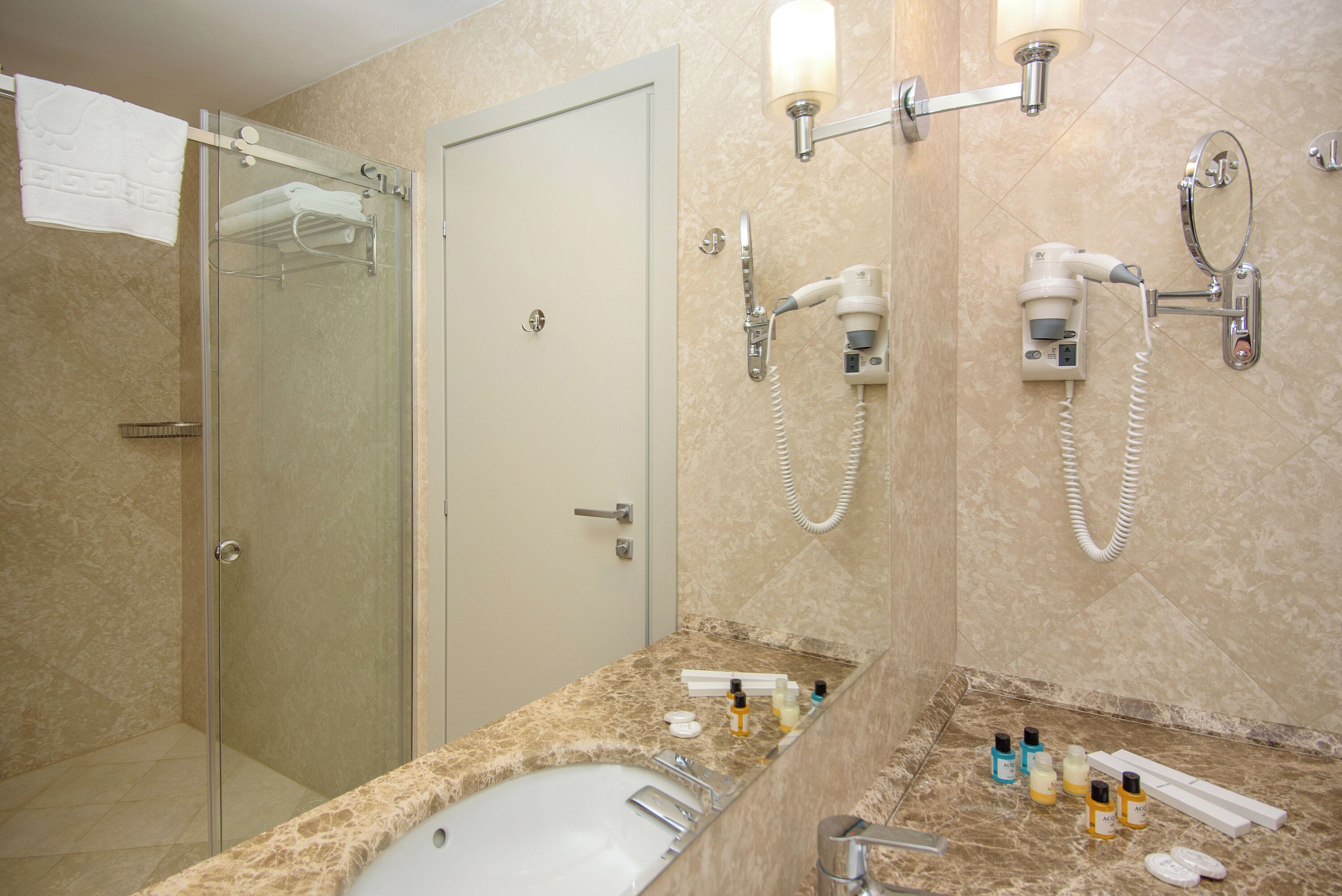 rainfall showerhead, free toiletries, hair dryer, dressing gowns