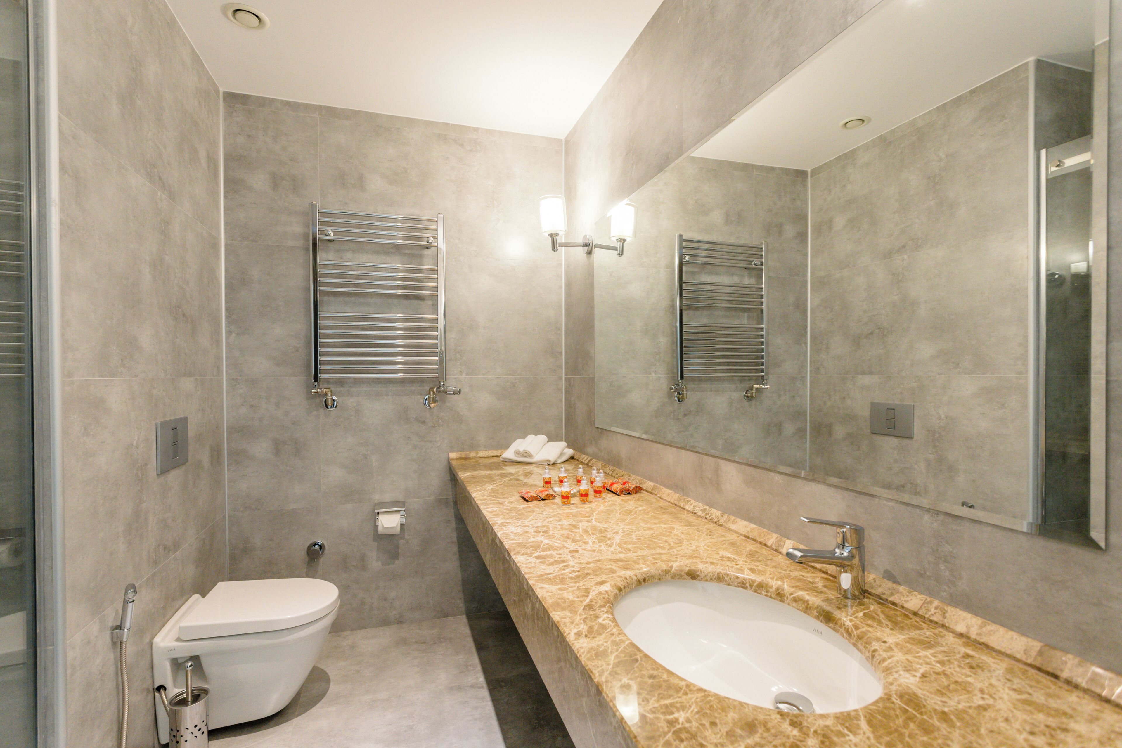 superior suite, city view | bathroom | rainfall showerhead, free toiletries, hair dryer, dressing gowns