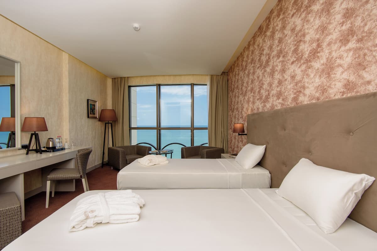 standard double room, sea view | minibar, in-room safe, desk, soundproofing