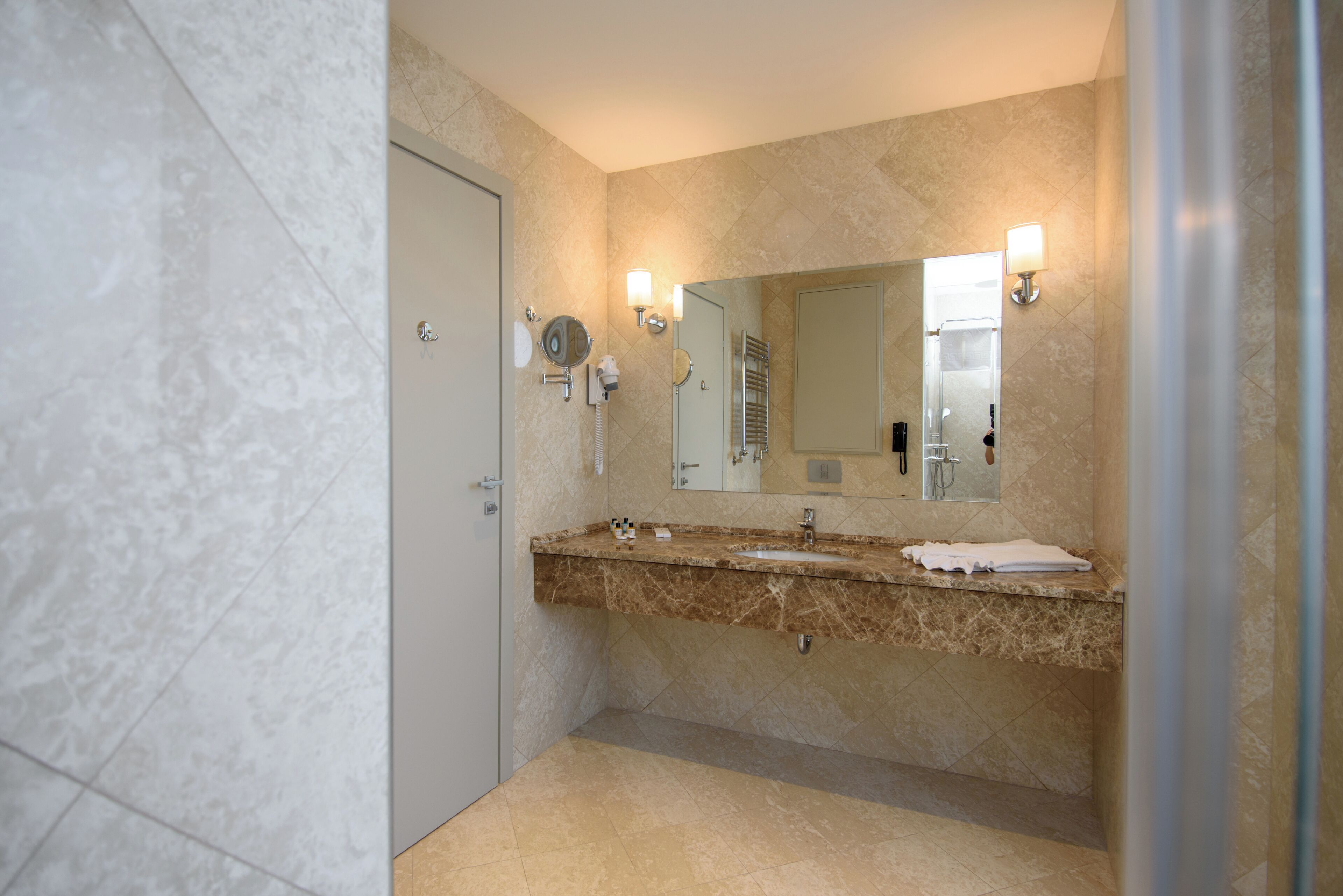 rainfall showerhead, free toiletries, hair dryer, dressing gowns