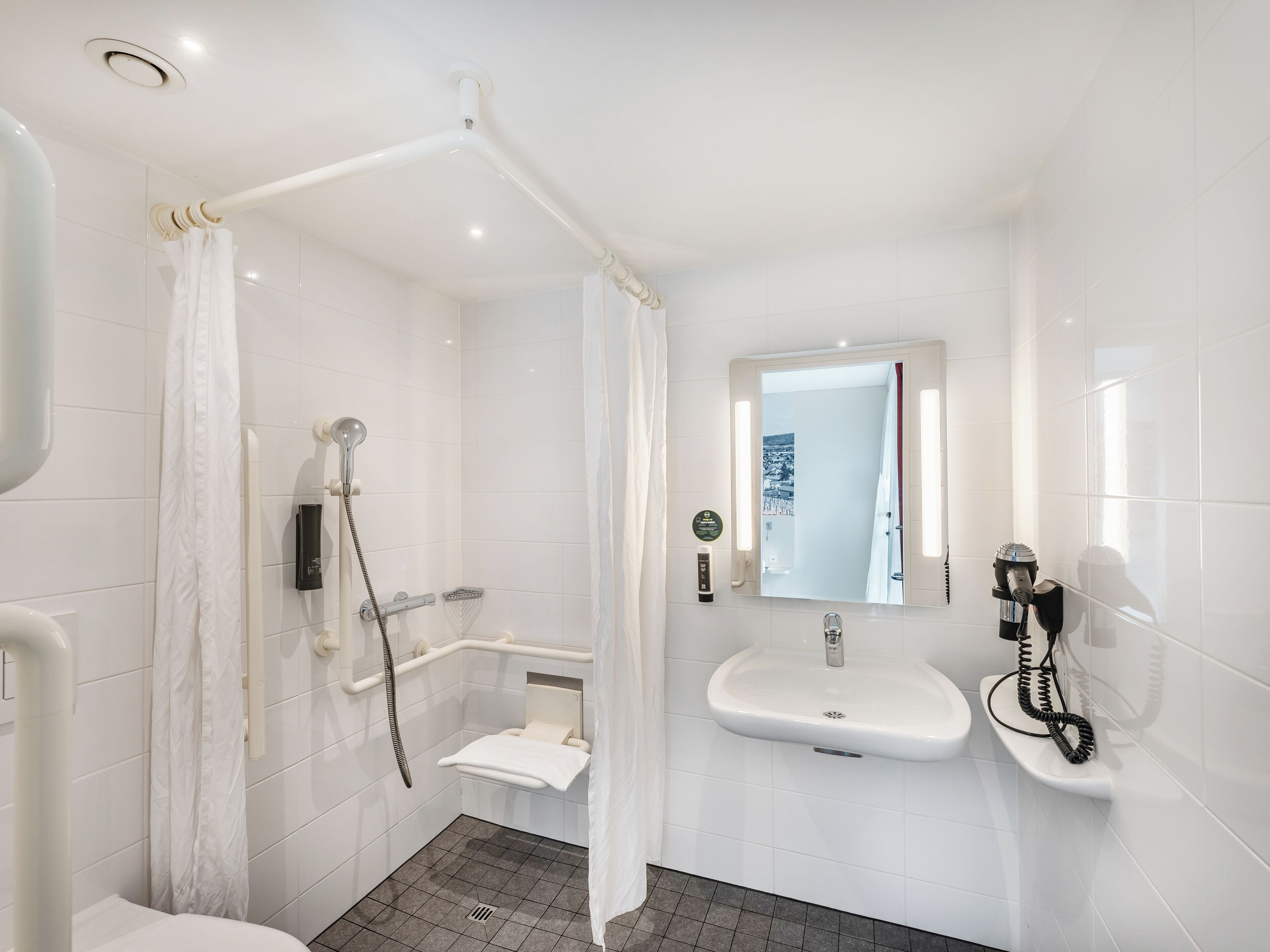 shower, free toiletries, hair dryer, towels