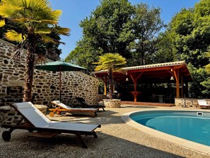 Outdoor pool, open 8:00 AM to 11:00 PM, pool umbrellas, sun loungers