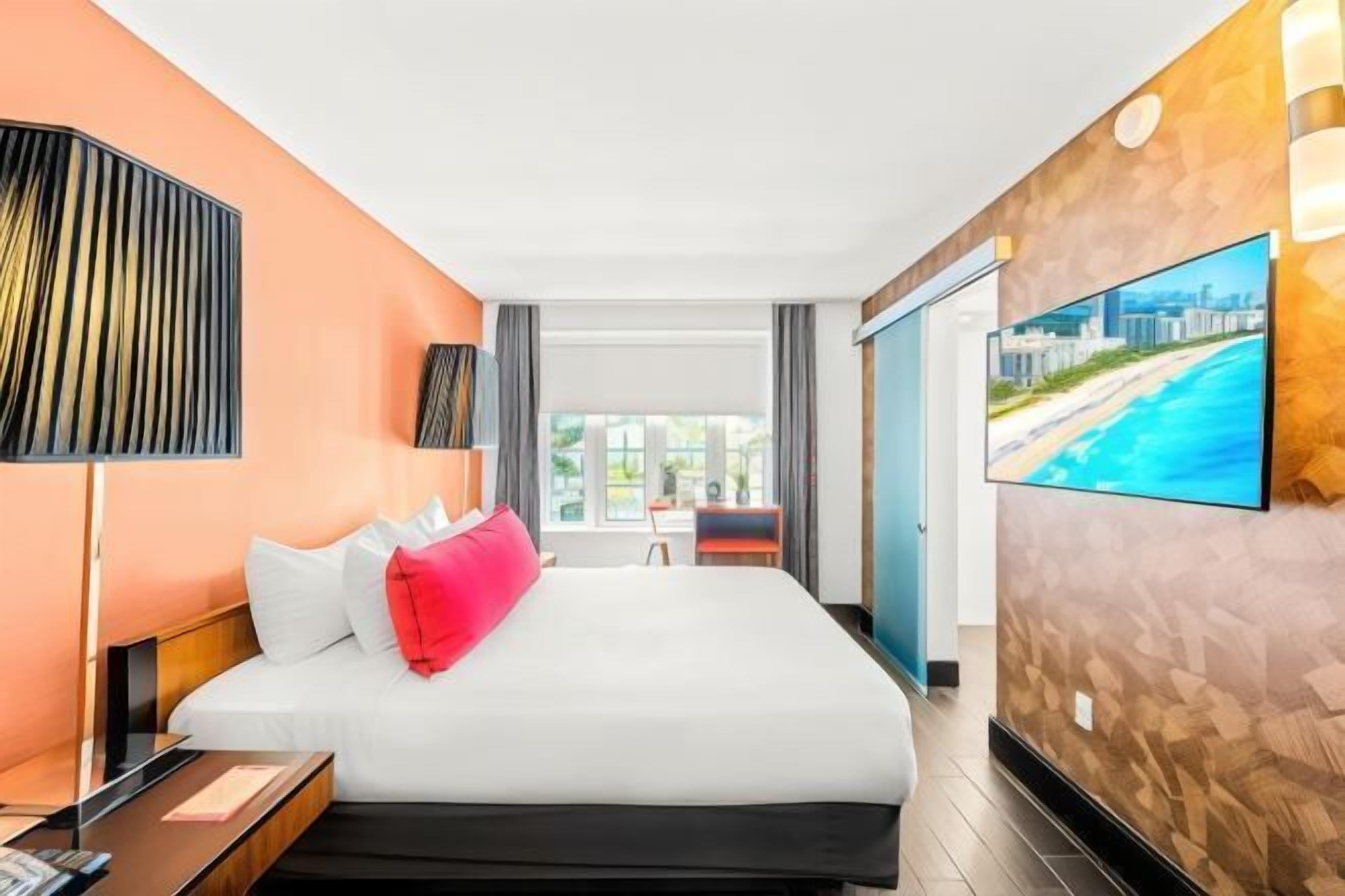 Hypo-allergenic bedding, minibar, in-room safe, desk