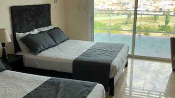 Condo familiar, 2 habitaciones | 2 habitaciones, wifi gratis y ropa de cama