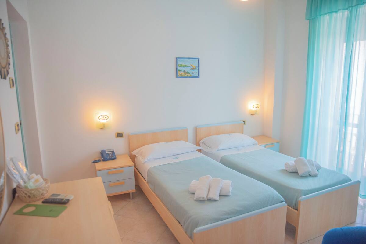 Standard Twin Room, Private Bathroom, Tower | Hypo-allergenic bedding, minibar, in-room safe, desk