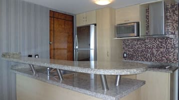 Family Condo, 2 Bedrooms | Private kitchen | Full-sized fridge, microwave, stovetop, coffee/tea maker