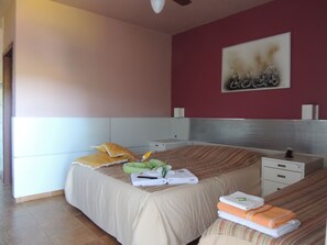 Basic Apartment, 1 Bedroom, Ground Floor | 1 bedroom, minibar, desk, bed sheets - Pousada Juriti Eco Hotel (Sao Roque)