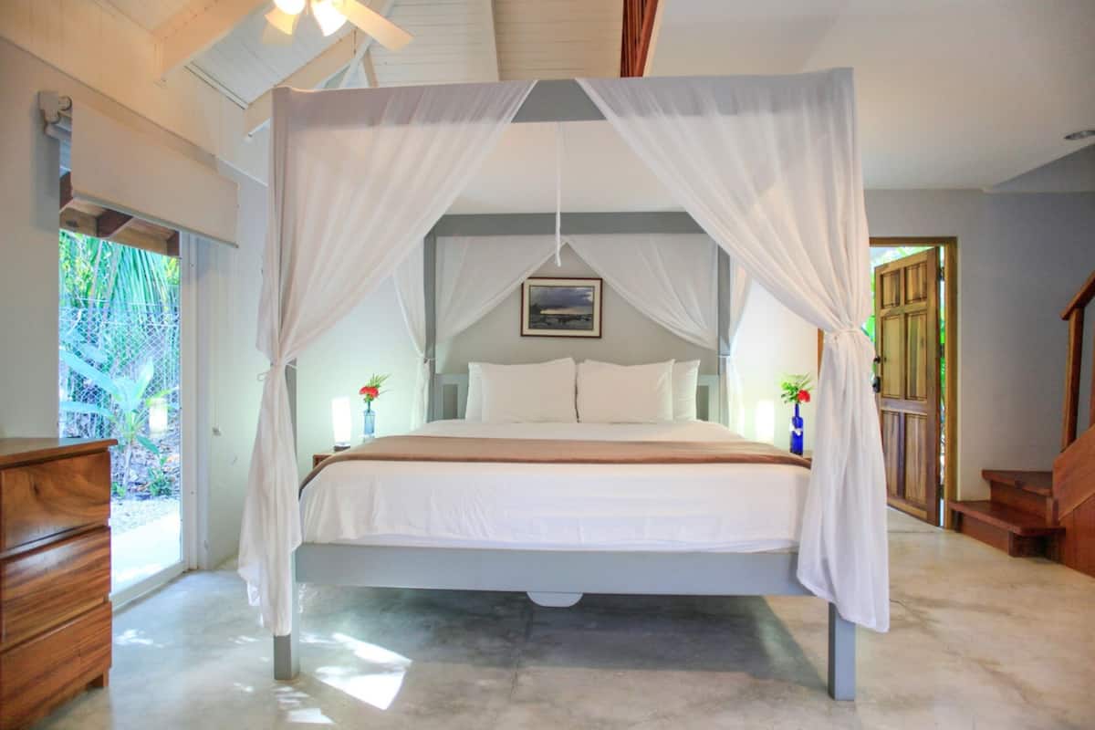 deluxe quadruple room, multiple beds, beachside (casa cassandra) | in-room safe, free wifi, bed sheets