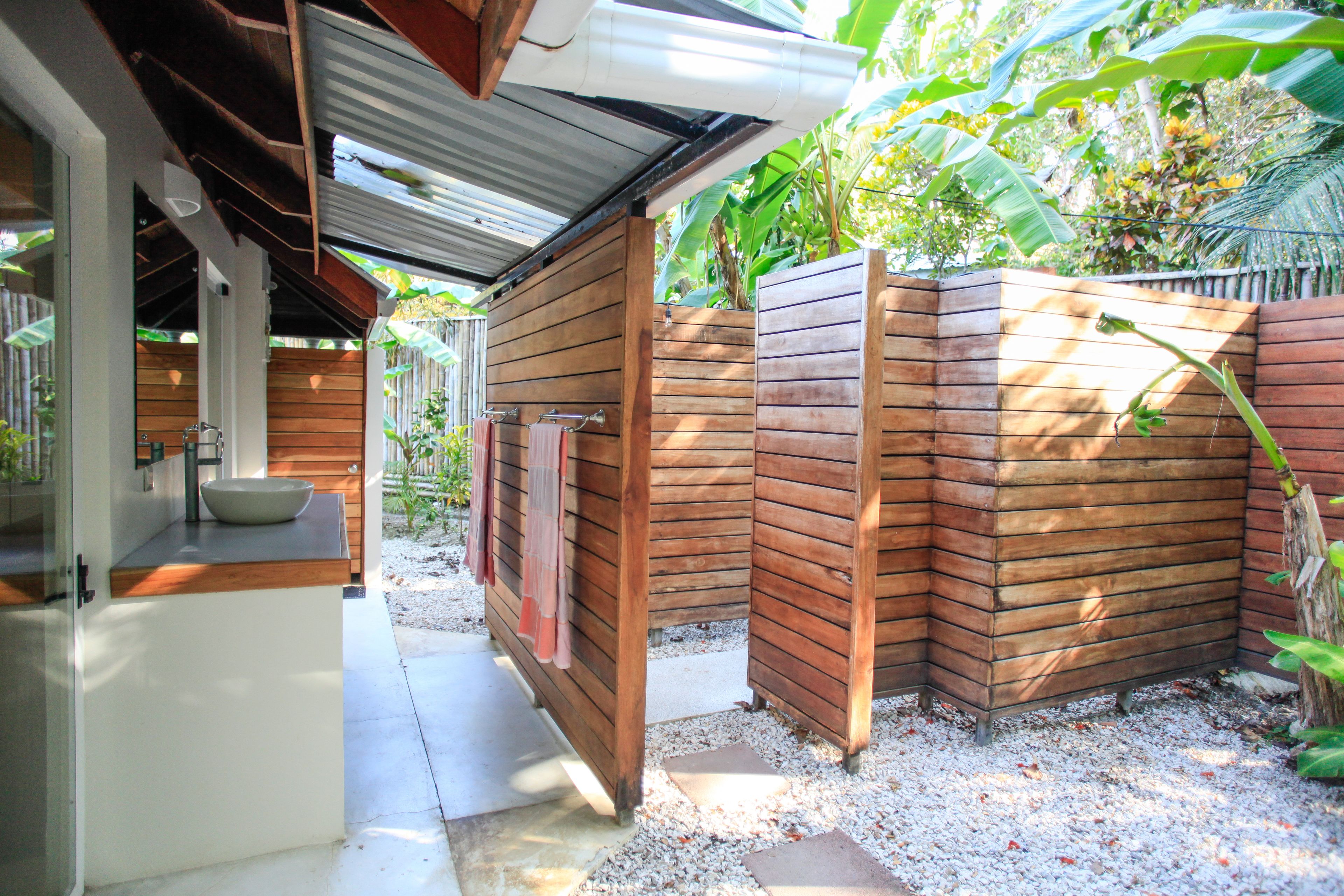 deluxe quadruple room, multiple beds, beachside (casa cassandra) | bathroom | shower, free toiletries, hair dryer, towels