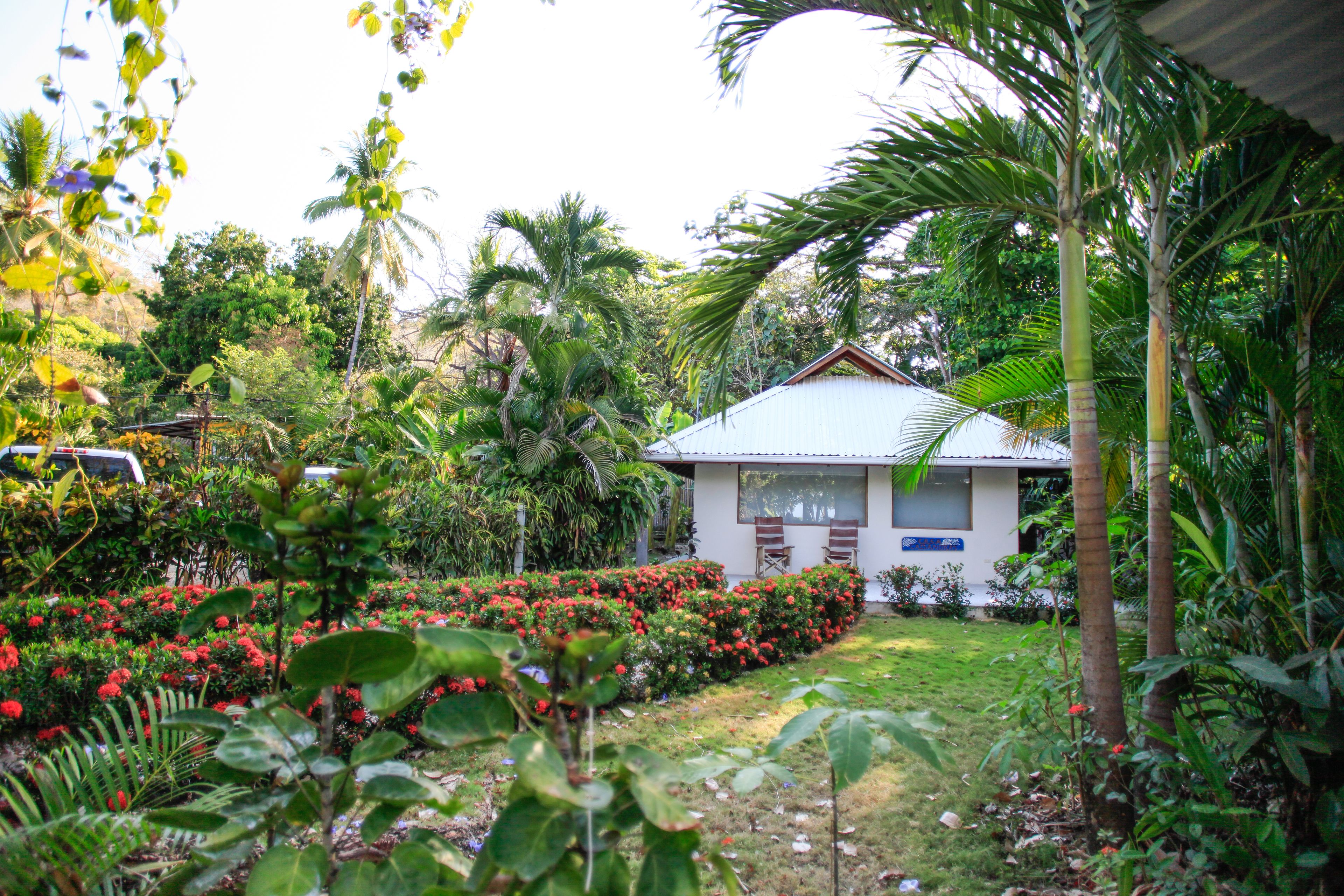 Deluxe Quadruple Room, Multiple Beds, Beachside (Casa Cassandra) | Garden view
