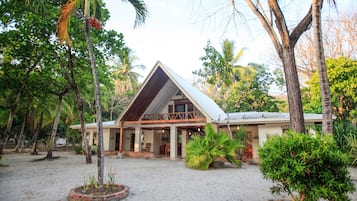 Surrounded by lush tropical vegetation, this resort offers a serene beachside setting.
