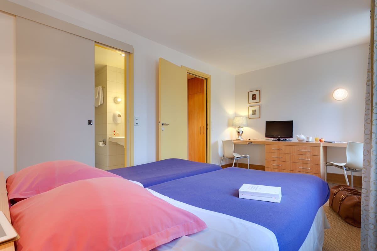 Blackout curtains, free WiFi, bed sheets