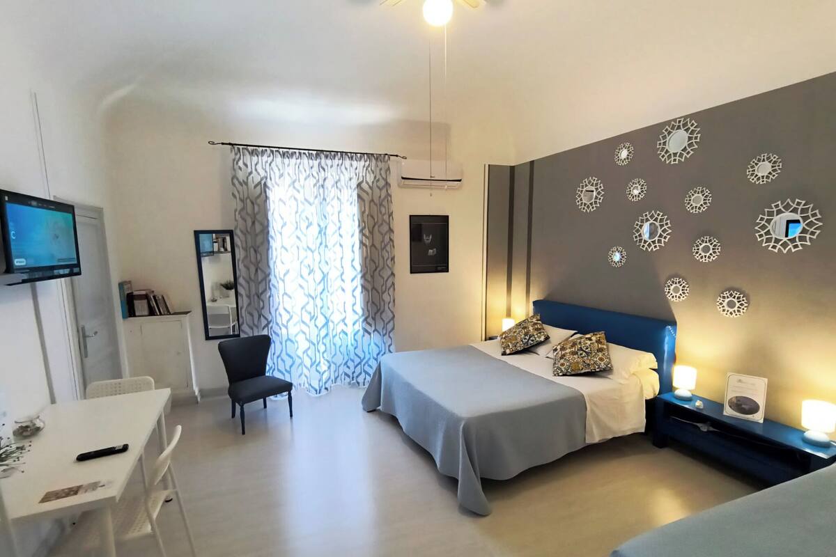 Premium bedding, down comforters, desk, laptop workspace