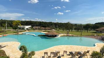 2 outdoor pools, open 9:00 AM to 9:00 PM, pool loungers