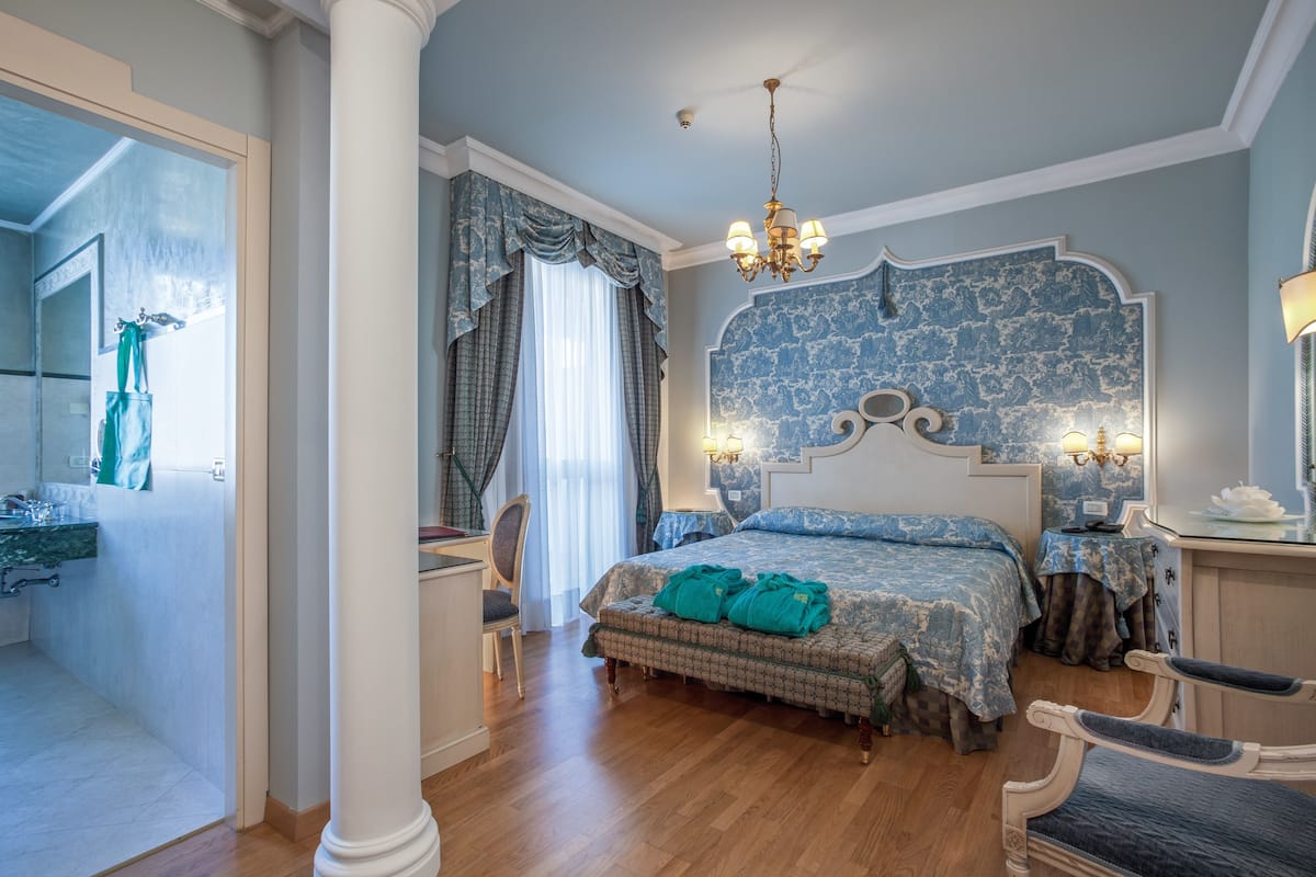 superior double or twin room | minibar, in-room safe, desk, blackout curtains