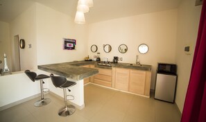 Deluxe Loft, 1 Bedroom, Smoking, Ocean View | Private kitchen | Full-size fridge, microwave, oven, stovetop