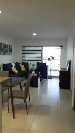 Family Condo, 2 Bedrooms | Living area | Flat-screen TV - Condo Isa (Mazatlán)