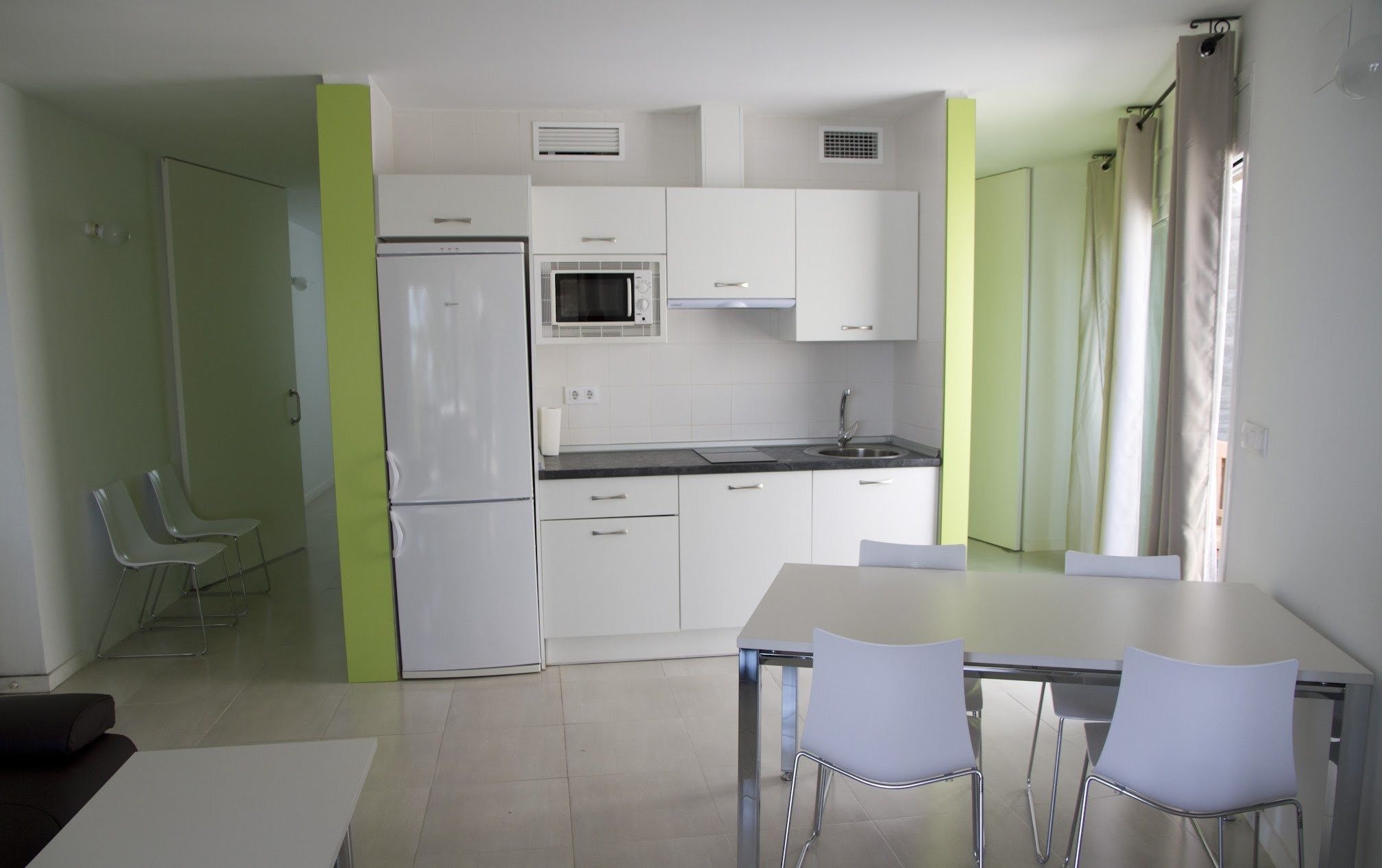 Bungalow, 1 Bedroom | Private kitchen | Full-size fridge, microwave, stovetop, coffee/tea maker